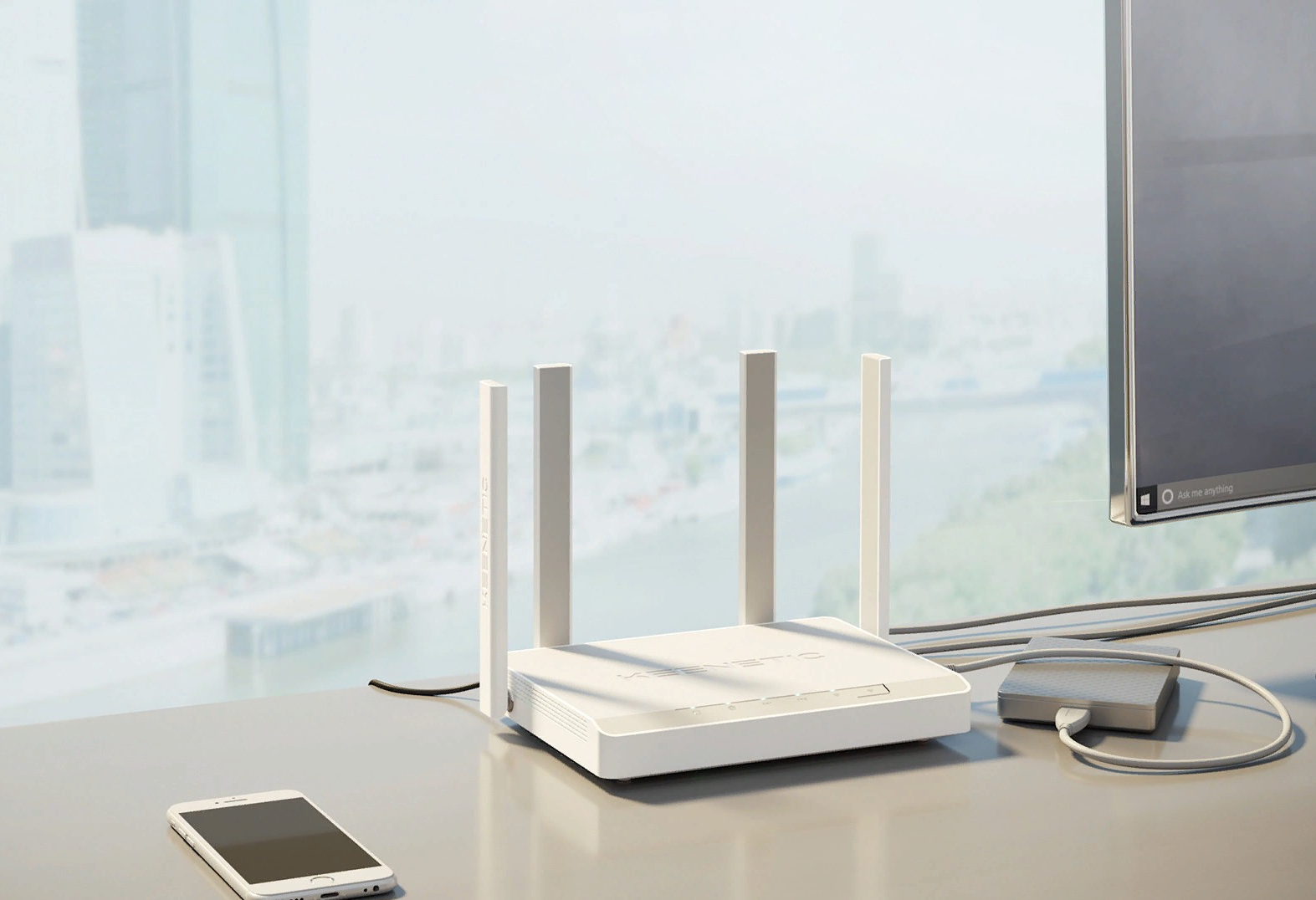 Роутер Keenetic KN-1010 стоит на столе