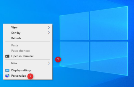 Щелкните правой кнопкой мыши рабочий стол и выберите «Персонализация».